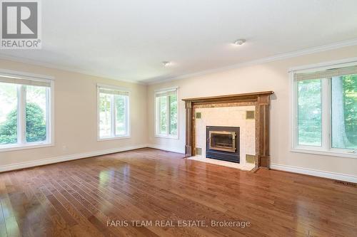 2087 Wilkinson Street, Innisfil, ON - Indoor Photo Showing Living Room With Fireplace