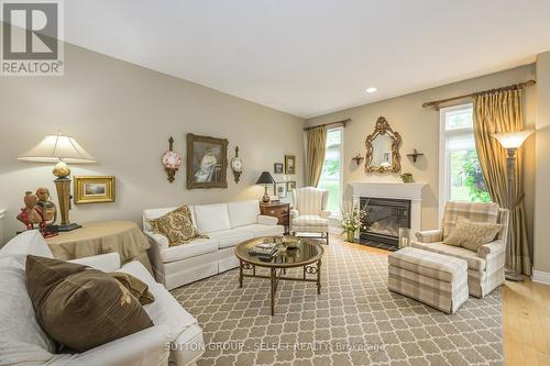 Sunny great room with gas fireplace - 5 - 578 Mcgarrell Place, London, ON - Indoor Photo Showing Living Room With Fireplace