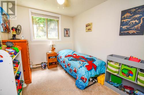 104 - 25 Meadow Lane, Barrie (Ardagh), ON - Indoor Photo Showing Bedroom