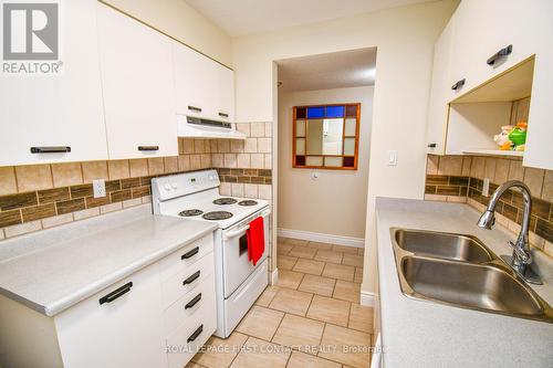 104 - 25 Meadow Lane, Barrie (Ardagh), ON - Indoor Photo Showing Kitchen With Double Sink