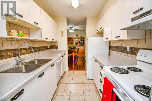 104 - 25 Meadow Lane, Barrie (Ardagh), ON - Indoor Photo Showing Kitchen With Double Sink