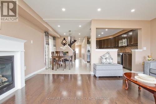 10 Davenhill Road, Brampton (Brampton East), ON - Indoor Photo Showing Living Room With Fireplace