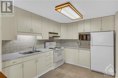 1465 Baseline Road Unit#108, Ottawa, ON - Indoor Photo Showing Kitchen With Double Sink