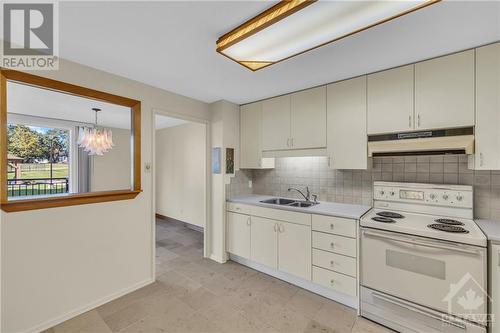 1465 Baseline Road Unit#108, Ottawa, ON - Indoor Photo Showing Kitchen With Double Sink