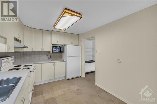 1465 Baseline Road Unit#108, Ottawa, ON - Indoor Photo Showing Kitchen With Double Sink