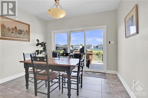 Dining room with patio door walk out to back deck. - 215 Capri Avenue, Embrun, ON - Indoor Photo Showing Dining Room