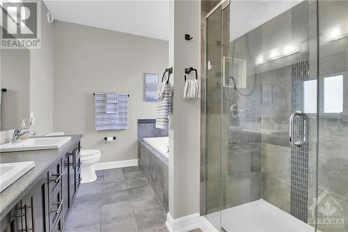 Luxurious 5 piece ensuite (soaker tub, separate shower & double sinks) - 215 Capri Avenue, Embrun, ON - Indoor Photo Showing Bathroom