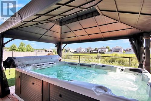 Luxurious 12 person swim spa (with custom cover) under gazebo - 215 Capri Avenue, Embrun, ON - Outdoor