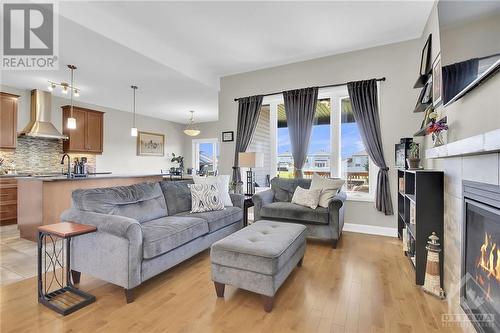 215 Capri Avenue, Embrun, ON - Indoor Photo Showing Living Room With Fireplace