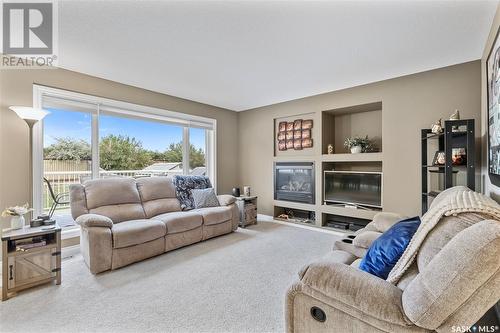 943 Gull Road, Regina, SK - Indoor Photo Showing Living Room With Fireplace