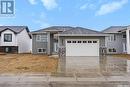 824 Weir Crescent, Warman, SK  - Outdoor With Facade 