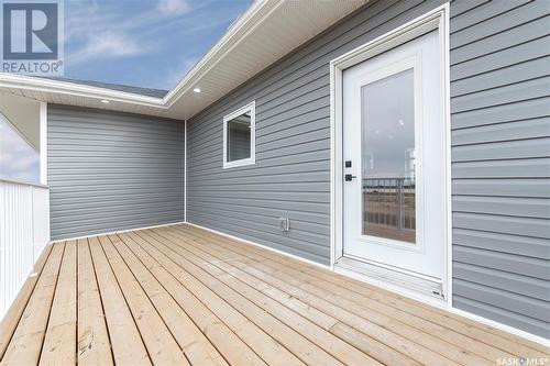 824 Weir Crescent, Warman, SK - Outdoor With Deck Patio Veranda With Exterior