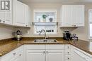 1480 Terai Road Unit# 111, Kelowna, BC  - Indoor Photo Showing Kitchen With Double Sink 