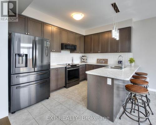 30 Fleming Crescent, Haldimand, ON - Indoor Photo Showing Kitchen With Stainless Steel Kitchen With Double Sink