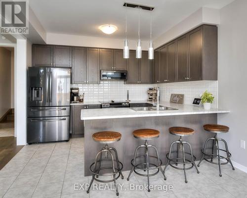 30 Fleming Crescent, Haldimand, ON - Indoor Photo Showing Kitchen With Stainless Steel Kitchen With Double Sink With Upgraded Kitchen