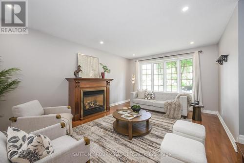 6907 Lambeth Walk, London, ON - Indoor Photo Showing Living Room With Fireplace