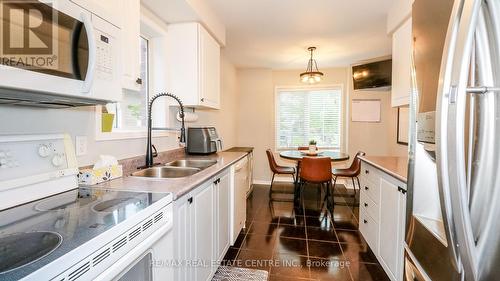 23 Wice Road, Barrie (Holly), ON - Indoor Photo Showing Kitchen With Double Sink