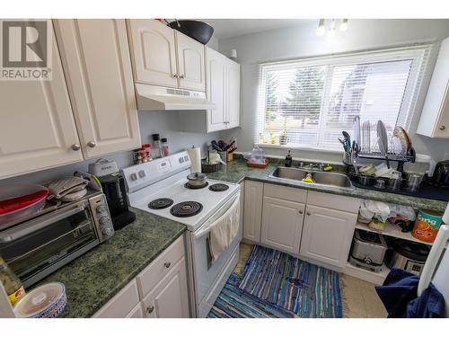 Sl1-Sl21 4045 1St Avenue, Prince George, BC - Indoor Photo Showing Kitchen With Double Sink