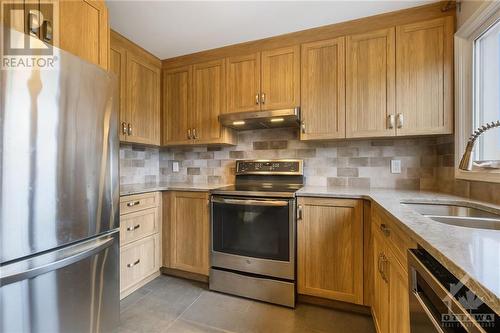 6201 Tealwood Place, Ottawa, ON - Indoor Photo Showing Kitchen With Double Sink