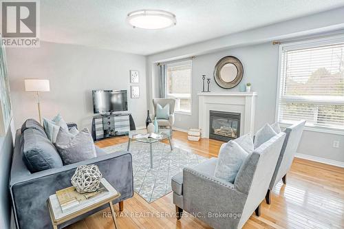 126 Luella Crescent, Brampton (Fletcher'S Meadow), ON - Indoor Photo Showing Living Room With Fireplace