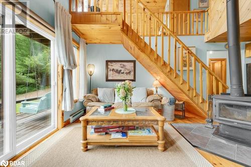 1018A Leisure Lane, Cloyne, ON - Indoor Photo Showing Other Room With Fireplace