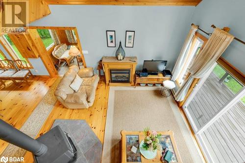 1018A Leisure Lane, Cloyne, ON - Indoor With Fireplace