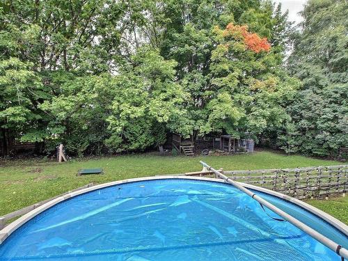 Pool - 10390 Rue Élisabeth-Ii, Québec (Les Rivières), QC - Outdoor With Above Ground Pool With Backyard