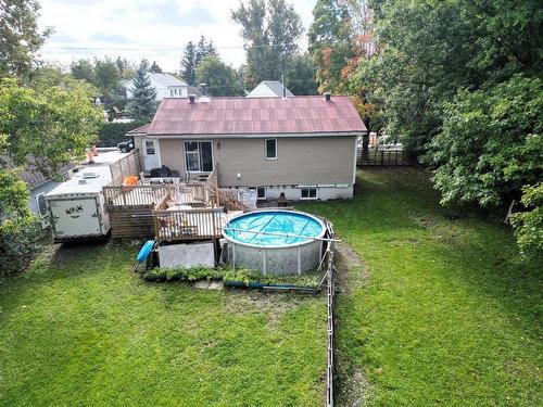 Back facade - 10390 Rue Élisabeth-Ii, Québec (Les Rivières), QC - Outdoor With Above Ground Pool With Backyard With Exterior