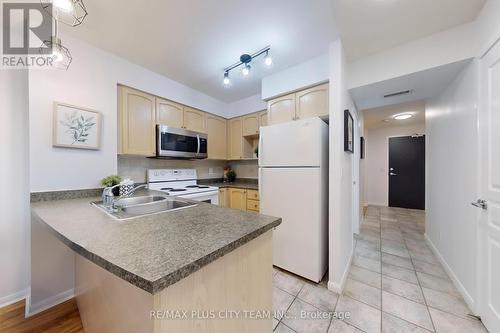 1801 - 18 Yonge Street, Toronto (Waterfront Communities), ON - Indoor Photo Showing Kitchen With Double Sink