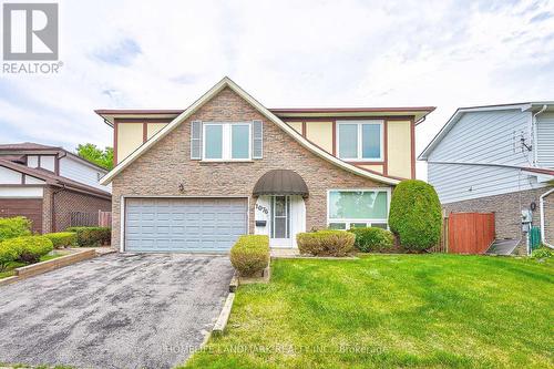 1076 Huntingwood Drive, Toronto, ON - Outdoor With Facade