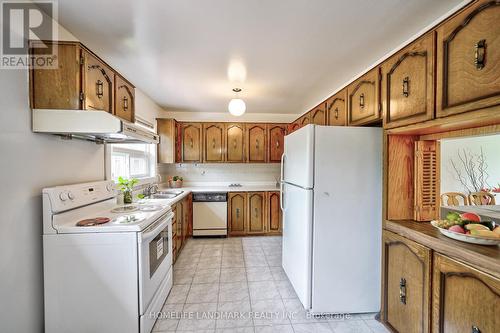 1076 Huntingwood Drive, Toronto, ON - Indoor Photo Showing Kitchen With Double Sink