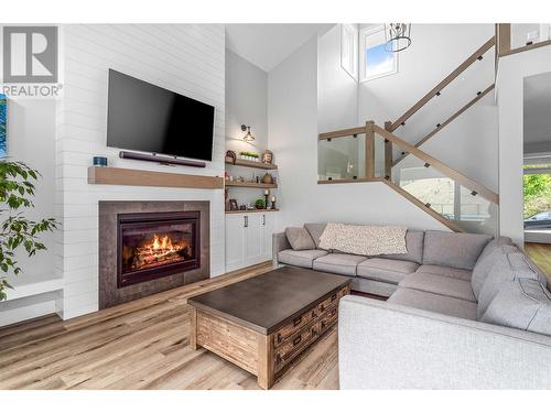 115 Echo Ridge Drive, Kelowna, BC - Indoor Photo Showing Living Room With Fireplace