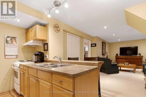 295 Plains Road W, Burlington (Bayview), ON - Indoor Photo Showing Kitchen With Double Sink