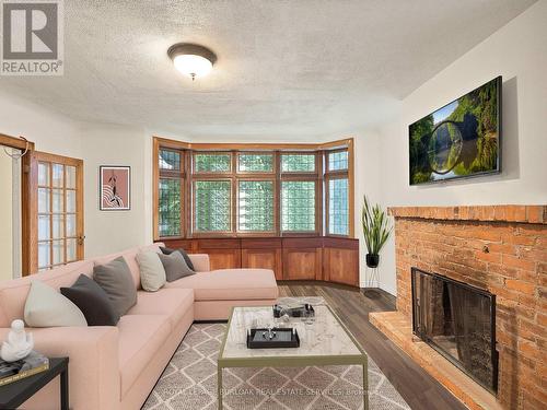 295 Plains Road W, Burlington (Bayview), ON - Indoor Photo Showing Living Room With Fireplace