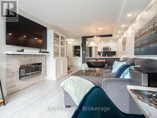 1601 - 3 Hickory Tree Road, Toronto (Weston), ON - Indoor Photo Showing Living Room With Fireplace