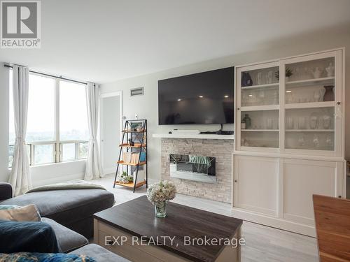 1601 - 3 Hickory Tree Road, Toronto (Weston), ON - Indoor Photo Showing Living Room With Fireplace