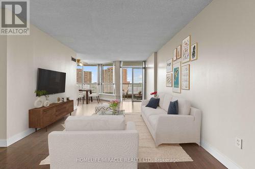 1610 - 1 Rowntree Road, Toronto (Mount Olive-Silverstone-Jamestown), ON - Indoor Photo Showing Living Room