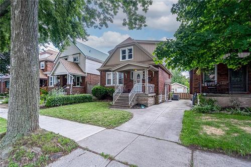 Quiet, tree-lined street. - 76 Weir Street N, Hamilton, ON - Outdoor With Deck Patio Veranda With Facade