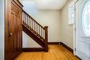 Original wood staircase. - 76 Weir Street N, Hamilton, ON  - Indoor Photo Showing Other Room 