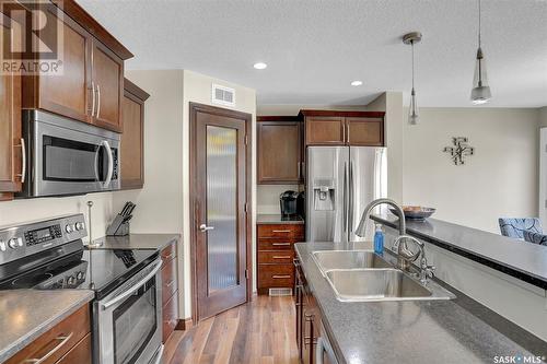 4270 Nicurity Drive, Regina, SK - Indoor Photo Showing Kitchen With Double Sink With Upgraded Kitchen