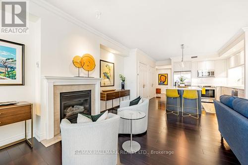 301 - 8 Sultan Street, Toronto (Bay Street Corridor), ON - Indoor Photo Showing Living Room With Fireplace