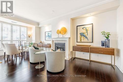 301 - 8 Sultan Street, Toronto (Bay Street Corridor), ON - Indoor Photo Showing Living Room With Fireplace