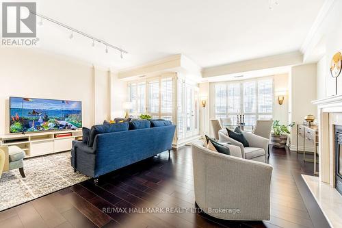 301 - 8 Sultan Street, Toronto (Bay Street Corridor), ON - Indoor Photo Showing Living Room With Fireplace