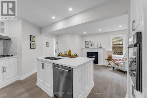 133 Huntington Park Drive, Markham (Thornlea), ON - Indoor Photo Showing Kitchen With Fireplace With Double Sink