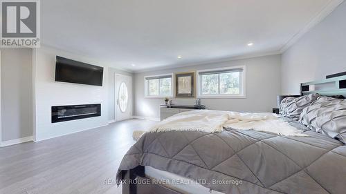 32 Dalmato Court, Vaughan (Vaughan Grove), ON - Indoor Photo Showing Bedroom With Fireplace