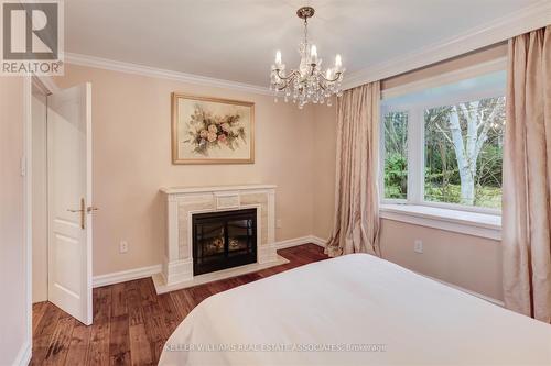 1416 Elaine Trail, Mississauga (Mineola), ON - Indoor Photo Showing Bedroom With Fireplace