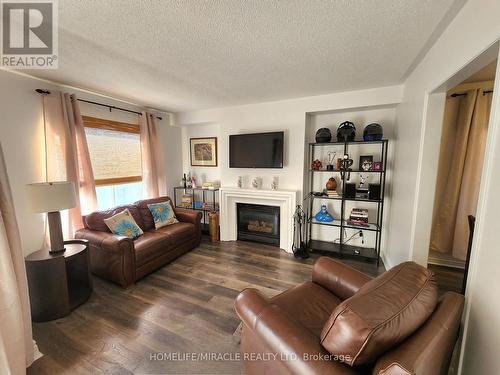 17 Clover Bloom Road, Brampton (Sandringham-Wellington), ON - Indoor Photo Showing Living Room With Fireplace