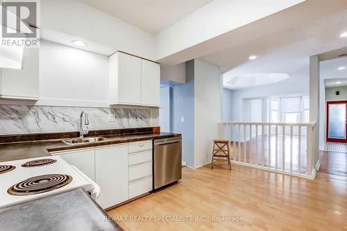 #Main - 86 Locke Street N, Hamilton, ON - Indoor Photo Showing Kitchen With Double Sink