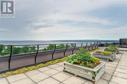 3100 Carling Avenue Unit#110, Ottawa, ON - Outdoor With Body Of Water With Deck Patio Veranda With View