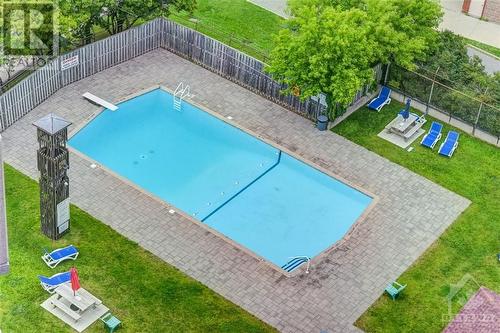 3100 Carling Avenue Unit#110, Ottawa, ON - Outdoor With In Ground Pool